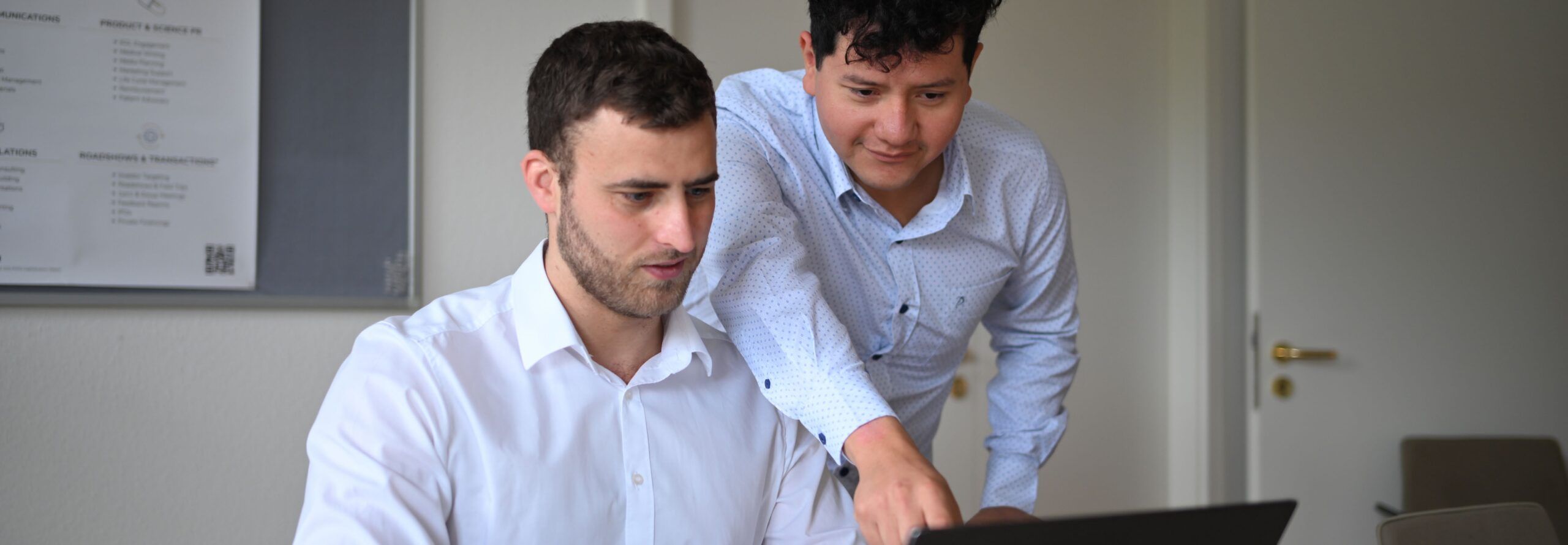Text "Join us and work in Life Sciences Communications" on a blurred background